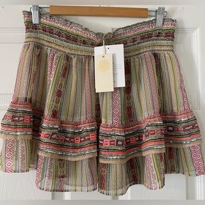 Multi colored and bedazzled sheer bathing suit cover.